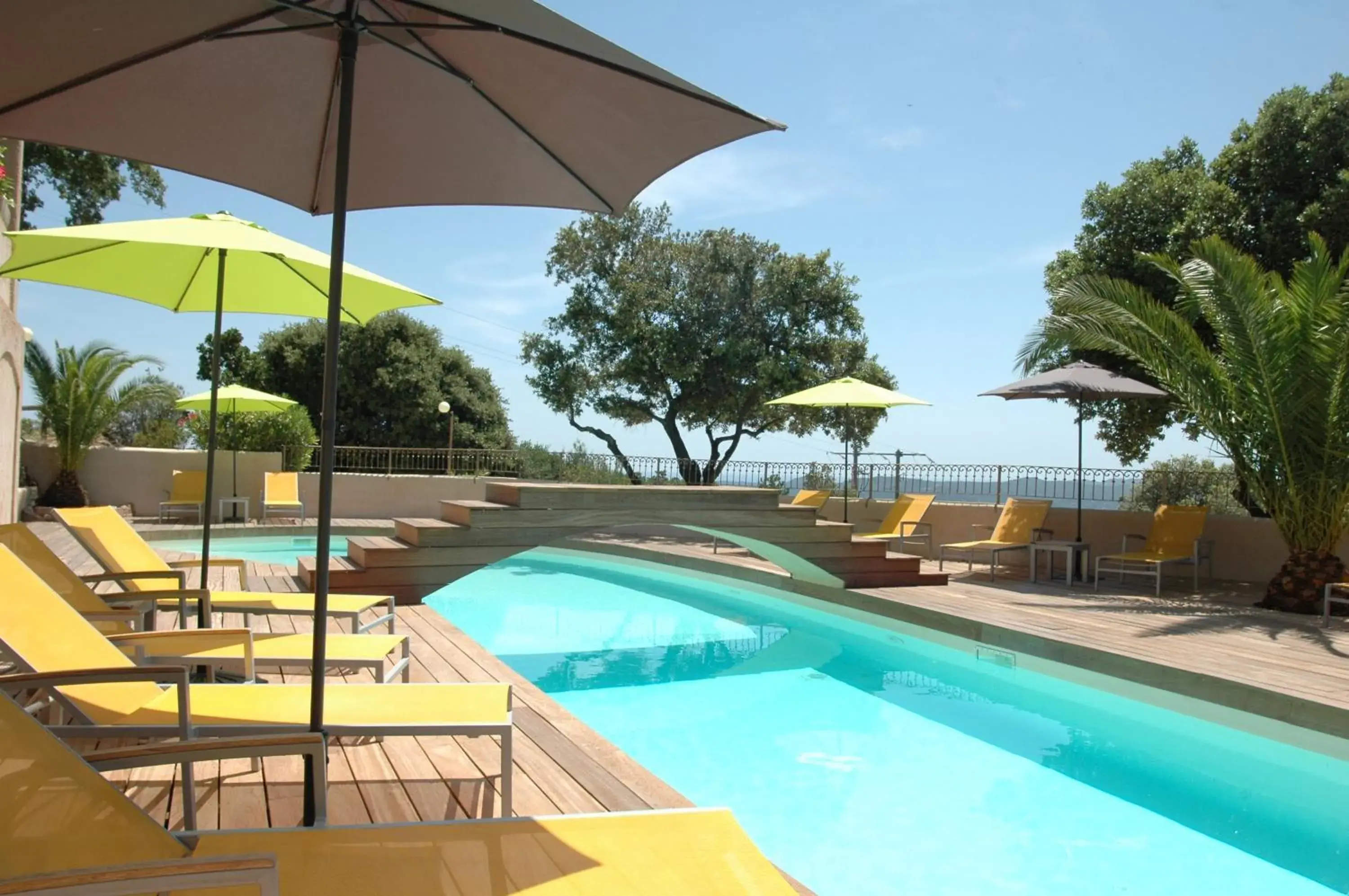 Swimming pool in Bungalows Du Maquis